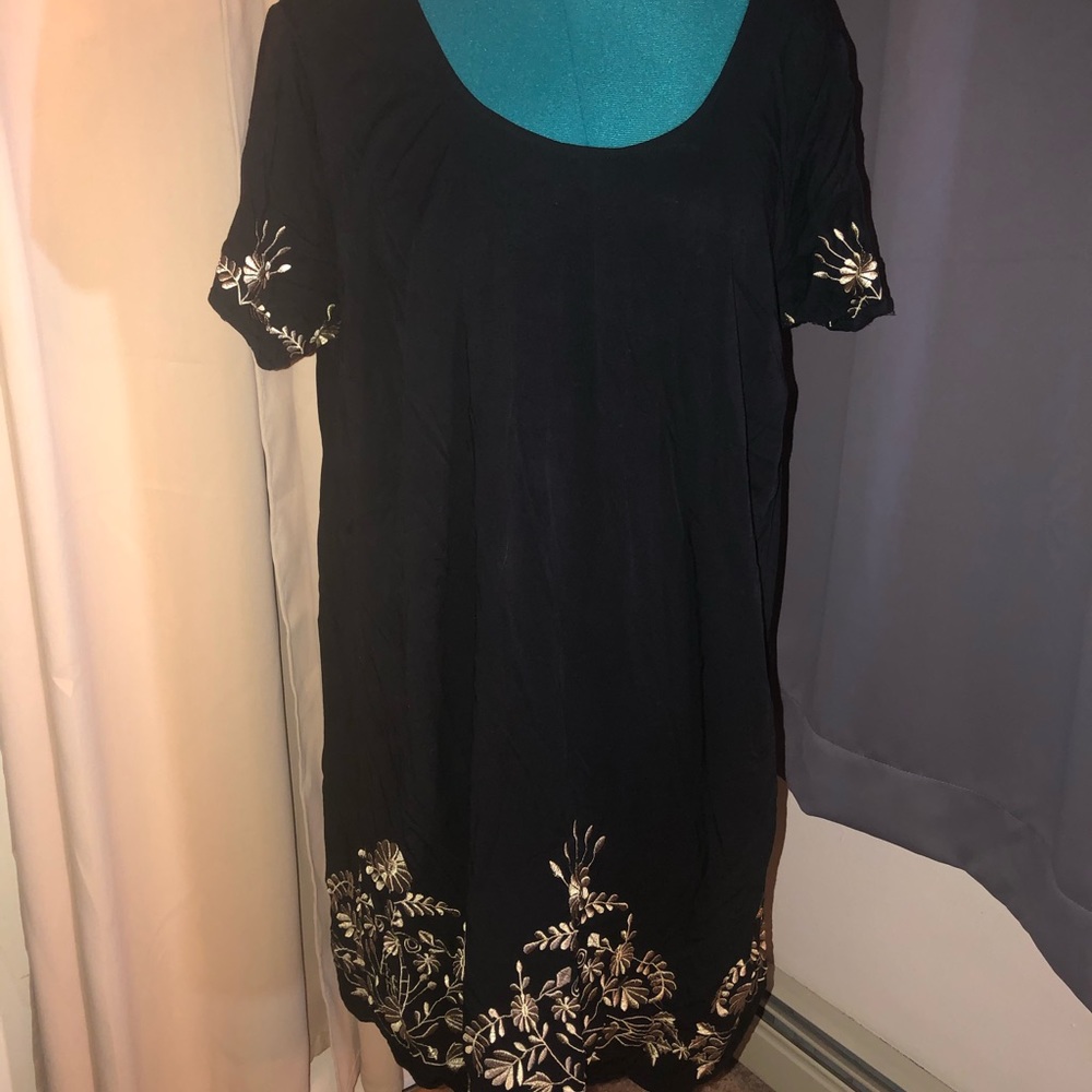 Mini black dress with gold embellishments